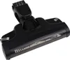 A black vacuum cleaner brush head is shown against a white background. Produktbild-Vorschau