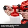 A person's hands are shown disassembling a part of a red electric paint sprayer over a white background. Produktbild-Vorschau