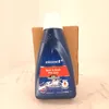 A bottle of Bissell Spot & Stain Pro Oxy cleaner is shown in front of a cardboard box. Voir les images du produit