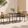 An outdoor dining set with a table and two chairs on a patio. Anteprima dell’immagine prodotto
