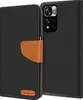 A black flip case for a smartphone is shown open, revealing the phone's camera module. Produktbild-Vorschau