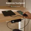 A desk with a tablet and smartphone being charged, and a control unit for a height-adjustable desk. Produktbild-Vorschau