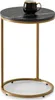 A small round side table with a black marble top and gold metal legs, with a black mug on top. Náhled obrázku produktu