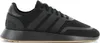 A side view of a black Adidas sneaker with a gum sole. Produktbild-Vorschau