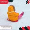 A child is sledding down a snowy hill. Voir les images du produit