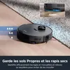 A robot vacuum cleaner is shown on a rug and hardwood floor, with a close-up inset showing its height clearance. Produktbild-Vorschau