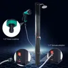 A black solar shower with a shower head and a hand shower attachment, connected to a water source via hoses and adapters. Close-up insets highlight the hose coupling and female adapter. Produktbild-Vorschau