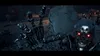 A Terminator robot with glowing red eyes reaches out its mechanical hand towards the viewer in a dark, gritty environment. Náhľad obrázku produktu