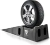 A car tire is placed on a black ramp. Anteprima dell’immagine prodotto