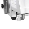 A close-up view of the bottom corner of a stainless steel appliance, showing a black rubber foot and a silver elbow fitting with a white cap. Produktbild-Vorschau