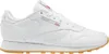 A side view of a white Reebok Classic Leather sneaker with a gum sole. Produktbild-Vorschau
