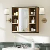 A bathroom vanity with a medicine cabinet, sink, faucet, and wall sconces. Produktbild-Vorschau