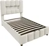 A beige upholstered bed frame with a slatted mattress base and a tufted headboard, shown from a diagonal angle against a white background. Produktbild-Vorschau