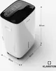 A white dehumidifier with a black top panel, shown on a white background with dimensions indicated by lines and text. Náhľad obrázku produktu