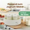 A yogurt maker with multiple jars filled with yogurt, accompanied by fruit and other jars of yogurt on a countertop. Produktbild-Vorschau