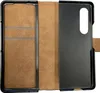 An open book-style phone case with card slots on the left and a phone holder on the right. Podgląd zdjęcia produktu