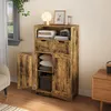 A rustic-style cabinet with doors and drawers, decorated with a lamp, books, and a camera on top. Produktbild-Vorschau