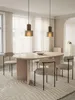 A dining room setting with a table and chairs. Anteprima dell’immagine prodotto