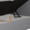 A close-up view of the internal mechanism of a bed frame, showing the lifting mechanism and a wooden support. Náhľad obrázku produktu
