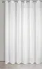 A white curtain hanging from a curtain rod. Náhľad obrázku produktu