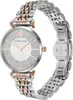 A close-up, studio shot of a women's wristwatch. Voir les images du produit