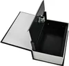 A book-shaped safe with the lid open, revealing the interior compartment. Anteprima dell’immagine prodotto