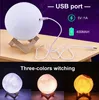 A collage showing a moon lamp with its charging cable and specifications, and three moon lamps in different colors. Produktbild-Vorschau