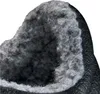 A close-up view of the inside of a black boot with gray fuzzy lining. Náhľad obrázku produktu