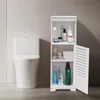 A white bathroom storage cabinet next to a white toilet. Náhled obrázku produktu