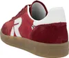 A close-up side view of a red sneaker. Voir les images du produit