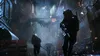 Soldiers running through a war-torn urban environment. Produktbild-Vorschau