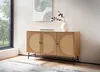 A modern sideboard in a living room setting, next to a large window. Produktbild-Vorschau