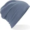 A close-up, studio shot of a blue beanie hat. Náhled obrázku produktu