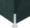 A close-up view of the corner of a green tent with a white leg support. Produktbild-Vorschau