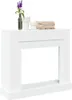 A white fireplace surround with decorative items on top. Anteprima dell’immagine prodotto