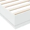 Close-up of the white frame and wooden slats of a bed base. Produktbild-Vorschau