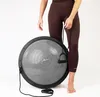 A person is holding a resistance band attached to a balance trainer. Anteprima dell’immagine prodotto