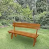 A wooden bench sits on a grassy lawn in a garden setting with trees and bushes in the background. Produktbild-Vorschau