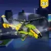 A Lego helicopter flying over a city at night. Anteprima dell’immagine prodotto