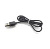 A black USB cable with a standard USB-A connector on one end and a micro-USB connector on the other, coiled and secured with a white twist tie. Náhled obrázku produktu