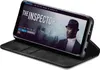 A black flip case for a Samsung Galaxy S8 phone, showing the phone's screen displaying a movie. Produktbild-Vorschau