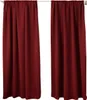 Two red curtains hanging on a white curtain rod against a white background. Produktbild-Vorschau
