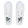 A top-down view of a pair of white Nike Court Legacy Lift sneakers on a white background. Náhled obrázku produktu