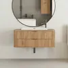 A modern bathroom vanity with a sink and faucet, reflected in a large round mirror. Anteprima dell’immagine prodotto