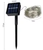 A solar-powered string light set with a solar panel and a coiled string of lights. Náhľad obrázku produktu