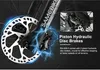 Close-up of a bicycle's disc brake system with illustrative lightning effects and text highlighting its features. Produktbild-Vorschau