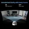 A white spherical camera is shown in the foreground, projecting a wide-angle view of a modern living room onto a curved screen above it. Text highlights the camera's features. Náhľad obrázku produktu