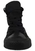 A front view of a black high-top Converse sneaker. Produktbild-Vorschau