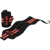 A pair of black wrist wraps with red stripes and branding, laid out on a white background. Náhľad obrázku produktu