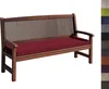 A wooden bench with a red cushion. Produktbild-Vorschau